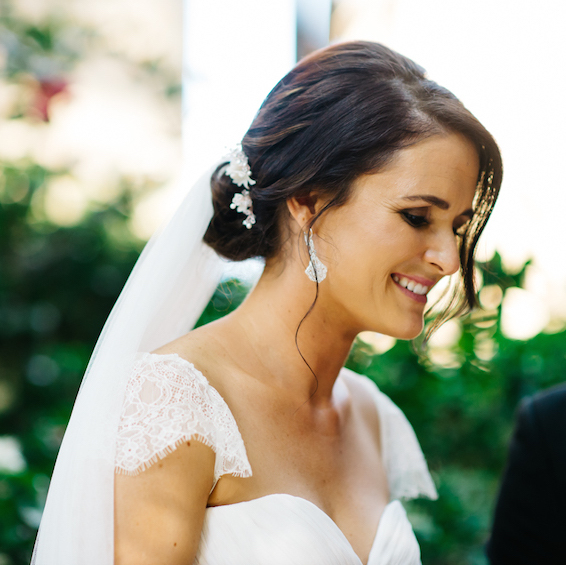 2018 wedding hair trends - low set updo with hair pins and veil