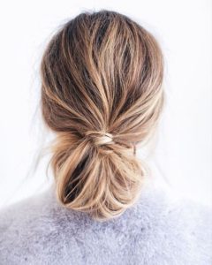 SImple messy tucked updo - 2018 wedding hair trends