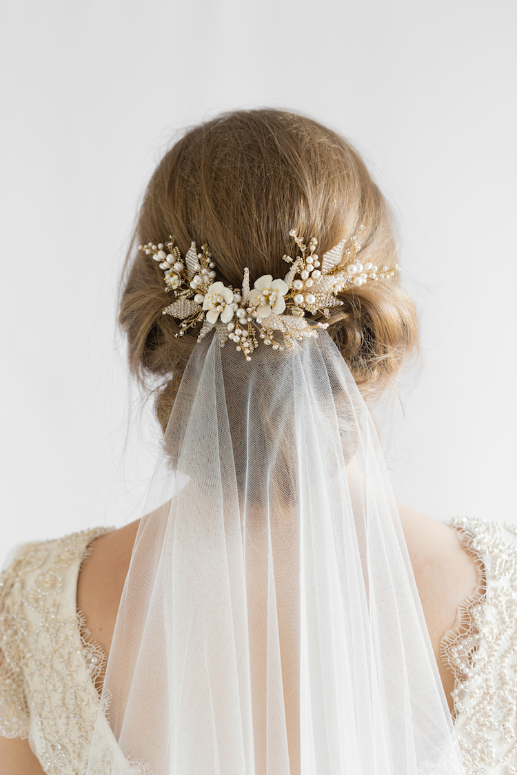 Image of Updo with veil quince hairstyle