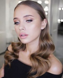 The essential guide to 2020 wedding hair_wavy hair with middle part 1