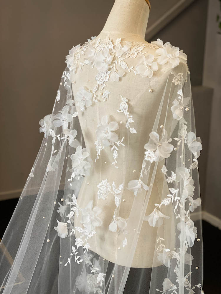 A floral lace wedding cape for Alexandra