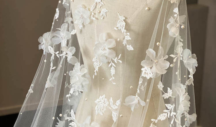Draped in flowers | A floral lace wedding cape for Alexandra