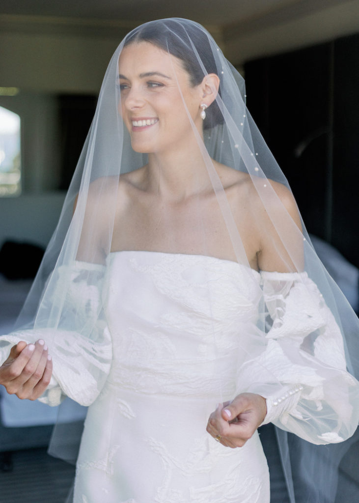 Bride Caitlin wears Theodore veil and Seychelles earrings 7