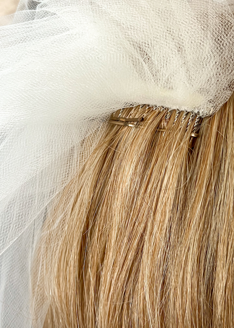 This trick will make your veil stay in place 8