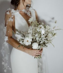 Bridal capes to elevate your wedding dress_Bride Alex wears DRAPED IN FLOWERS cape 7
