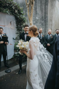 Bridal capes to elevate your wedding dress_Bride Ali wears DRAPED IN FLOWERS cape 4