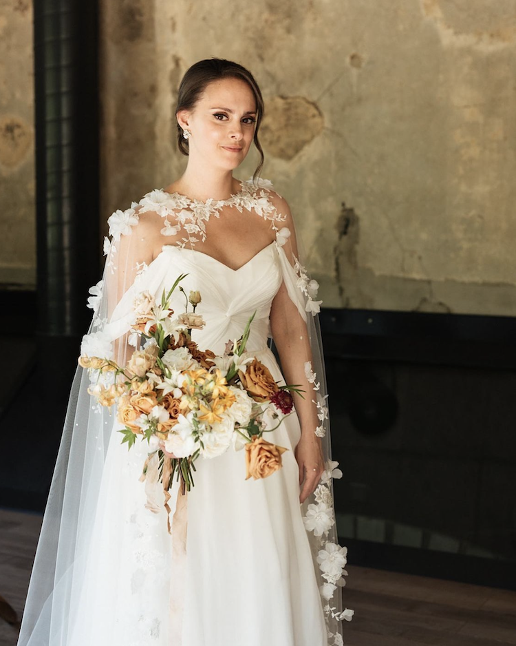 Bride Emmylou wears Draped in Flowers cape