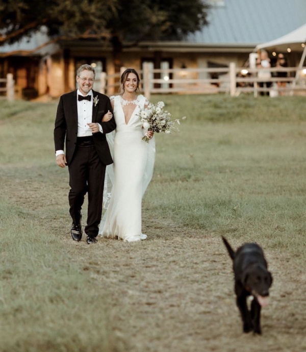 Bride Alex Wears The Draped In Flowers Cape 3.jpg