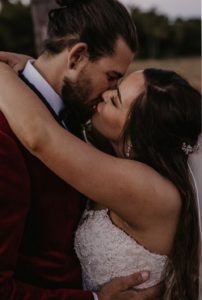 Bride Casey Wears The Tulip Earrings.png