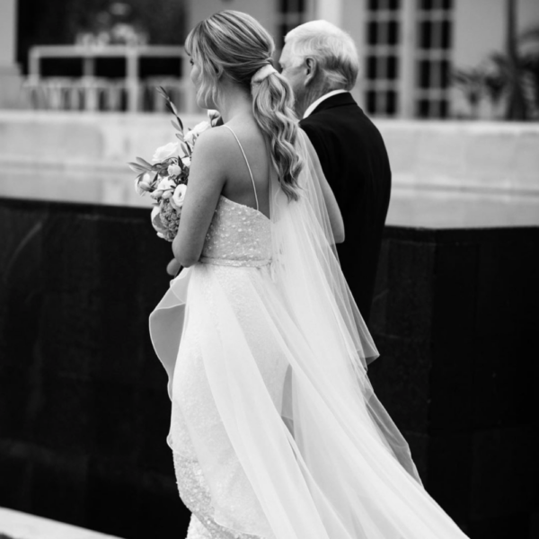 Bride Melanie Wears The Bordeaux Pony Tail Veil 1 E1572647273109.png