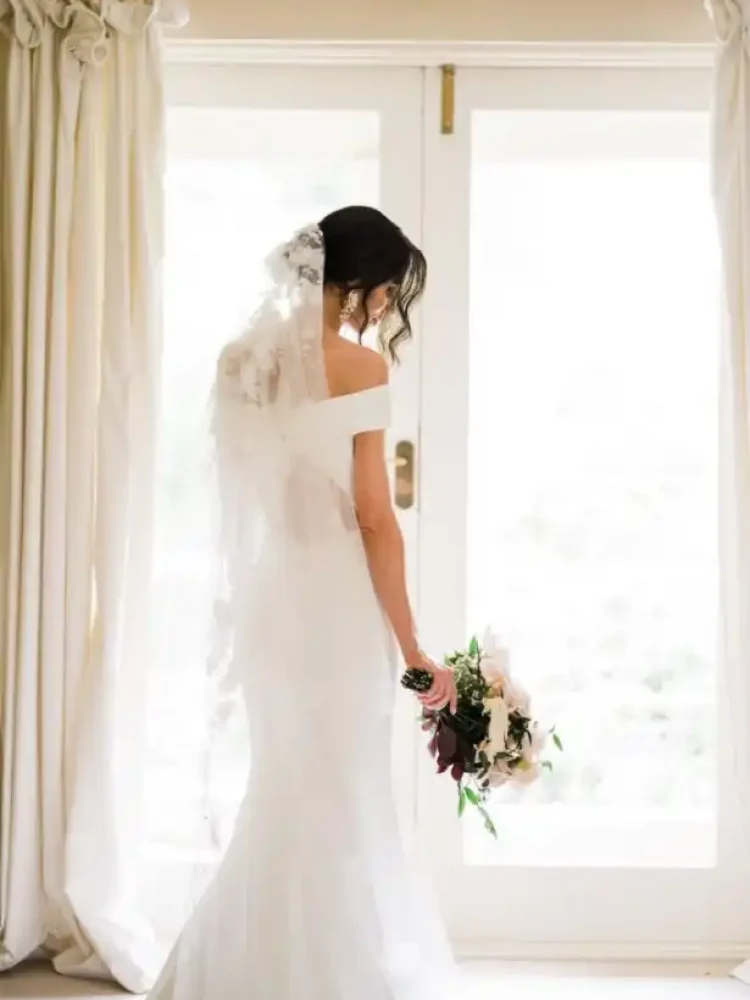 279 Bride Alicia Wears A Custom Riviera Veil With Blusher Aurora Earrings 1 683x1024