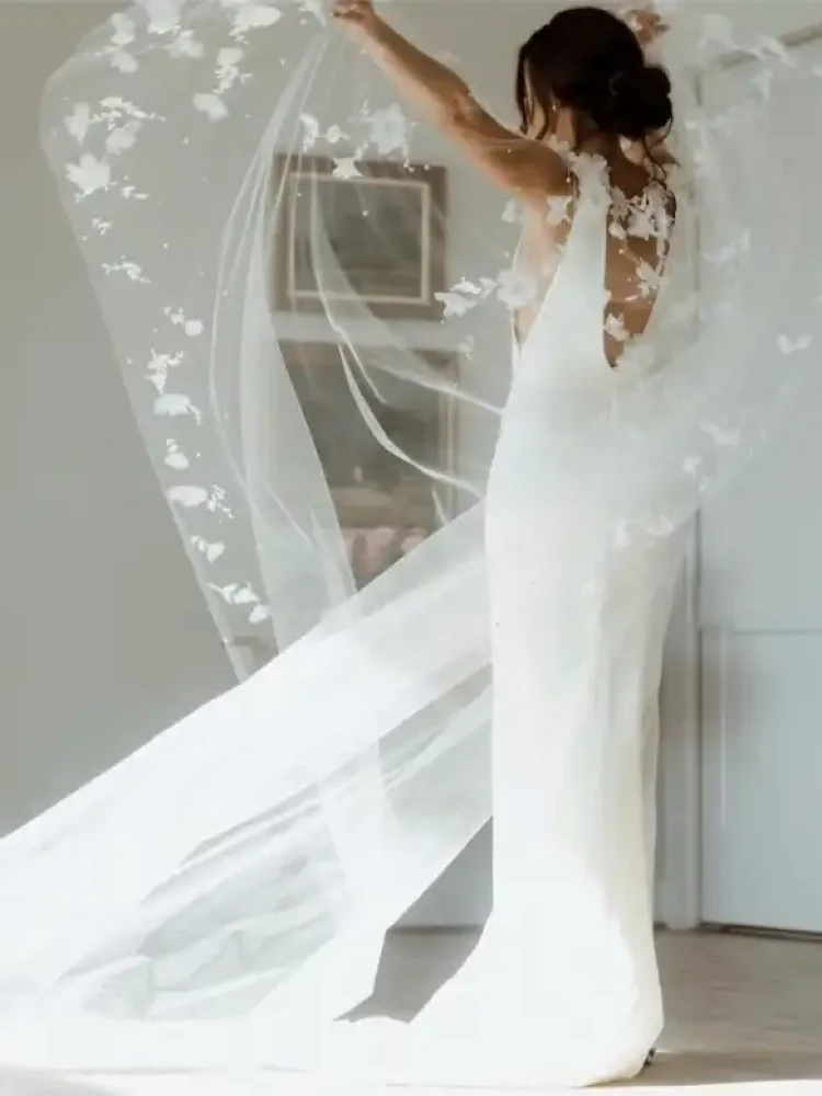 298 Bride Alex Wears The Draped In Flowers Cape 1 750x862