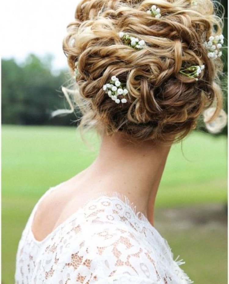 Naturally Curl Messy Updo With Flowers