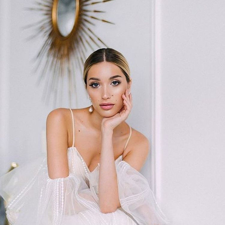 The Essential Guide To 2020 Wedding Hair Simple Updo With Middle Part 1