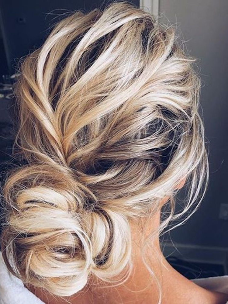 The Essential Guide To 2020 Wedding Hair Textured Updo 2