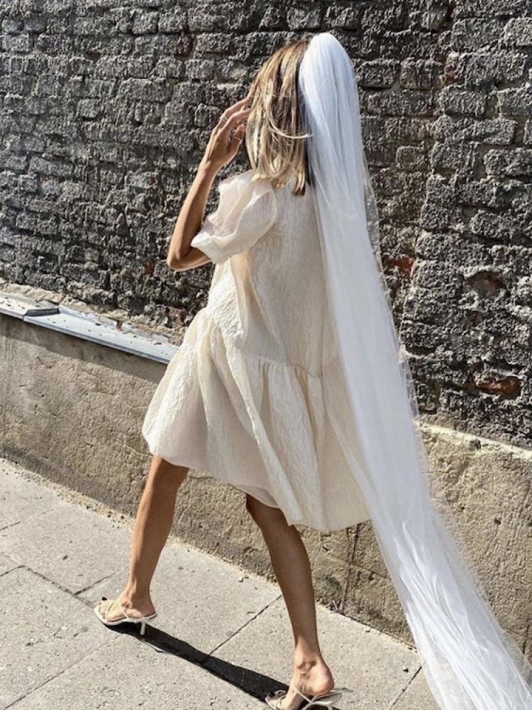 Your Guide To Styling A Short Wedding Dress With A Veil 21